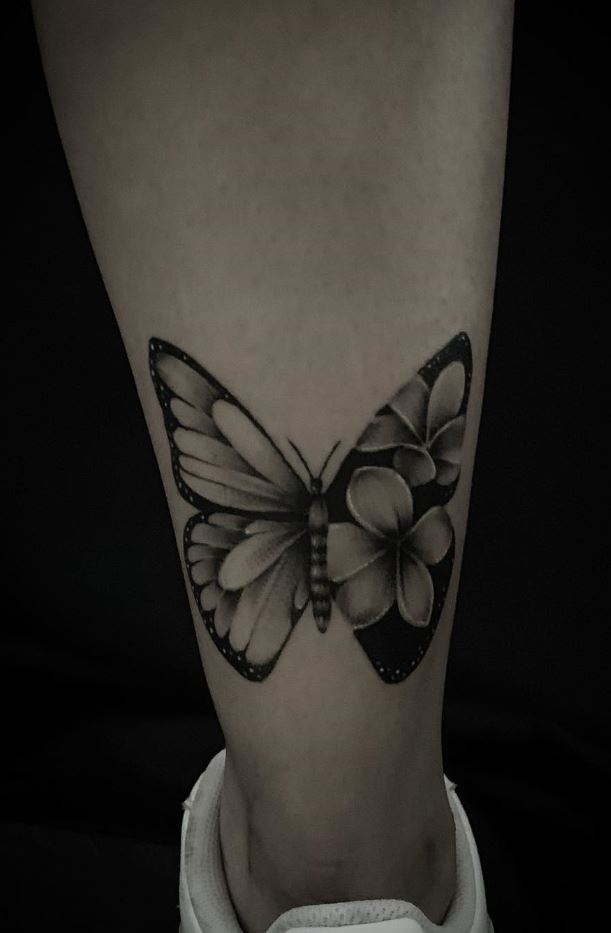 Black And White Butterfly Tattoo On Foot